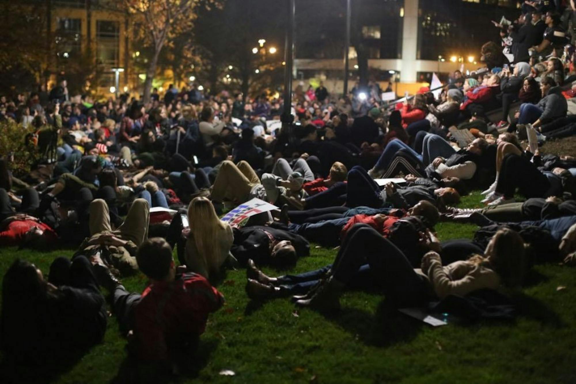 More than 2,000 students and members of the Madison community engage in a "die-in" at the Capitol steps in solidarity with historically marginalized groups.&nbsp;