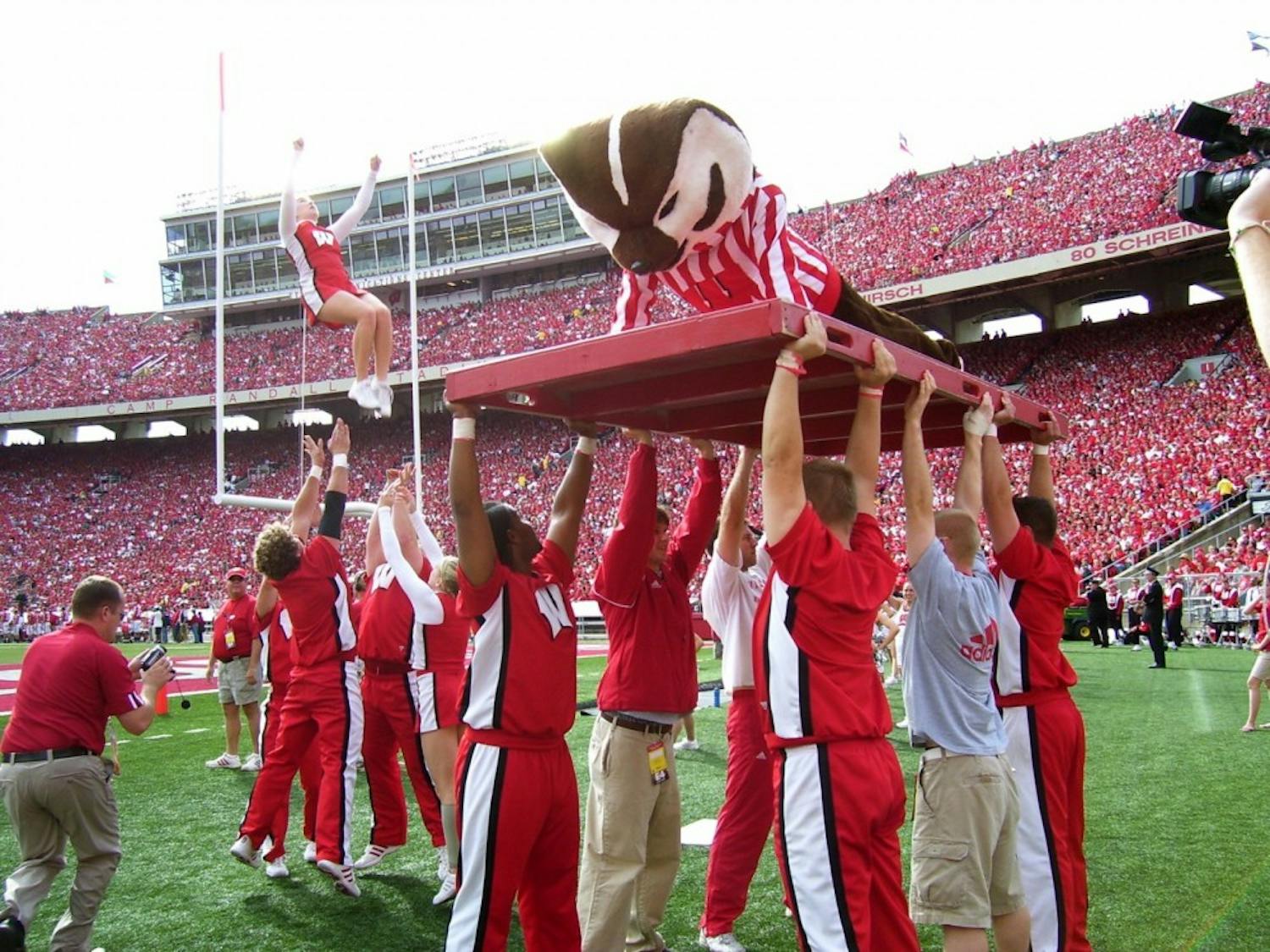 Bucky Badger does pushups
