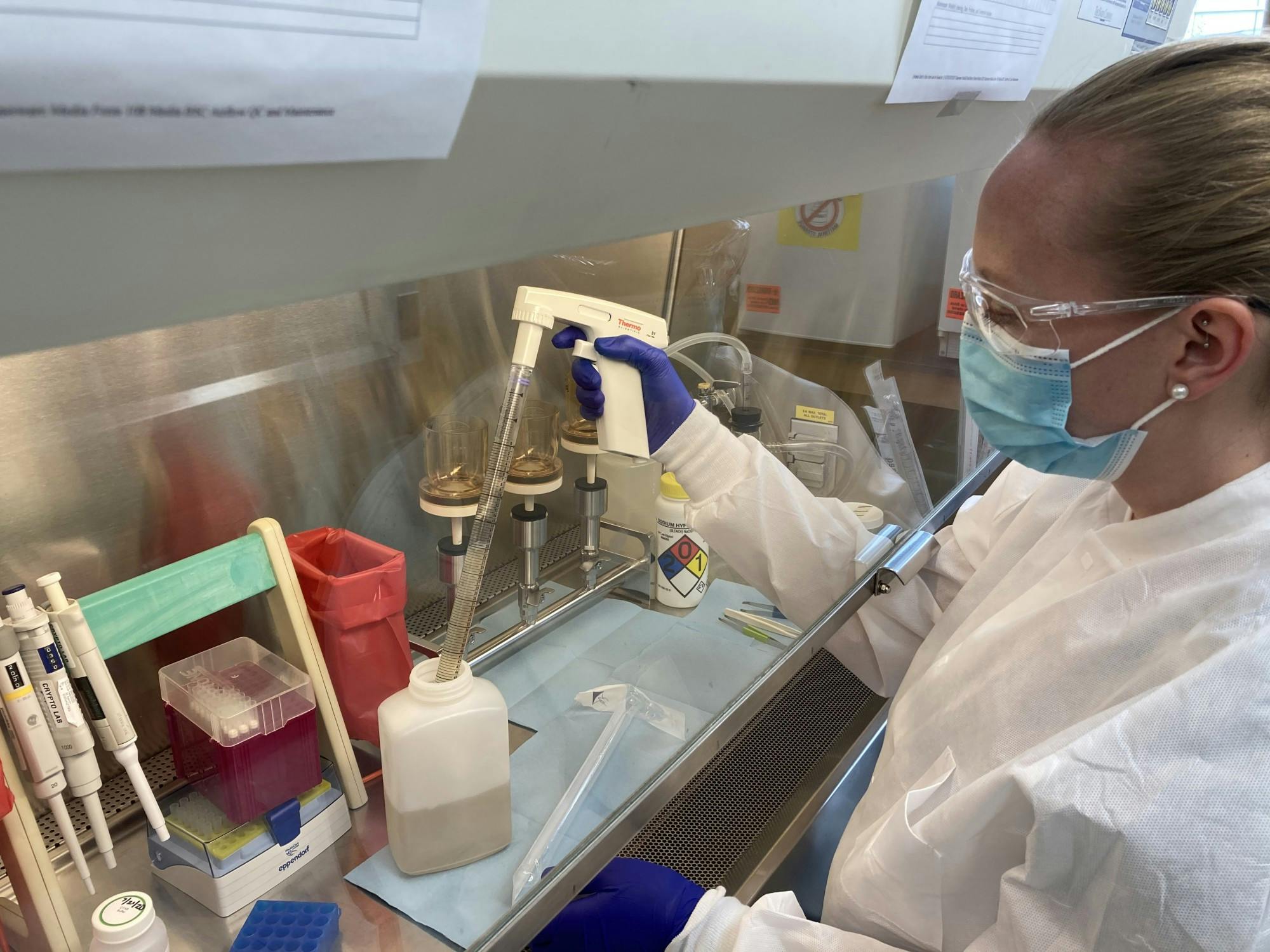 200914_kayley janssen pipettes sewage sample.JPG