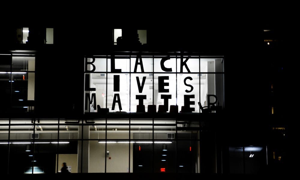 A prominent sign proclaiming “Black Lives Matter” currently hangs in the fourth floor office window of the Associated Students of Madison.