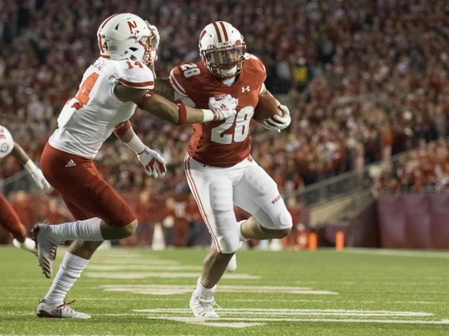 Senior running back Taiwan Deal was one of three UW backs to run for over 70 yards and collected a 20-yard touchdown in the third quarter.