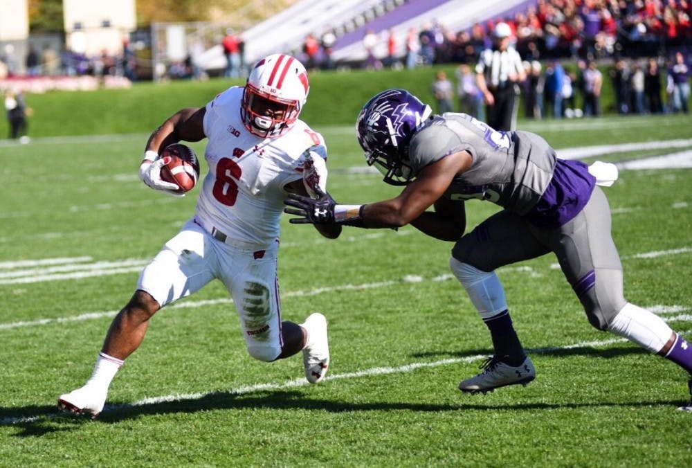 Corey Clement attempts to evade a defender during UW's 21-7 victory over Northwestern.&nbsp;
