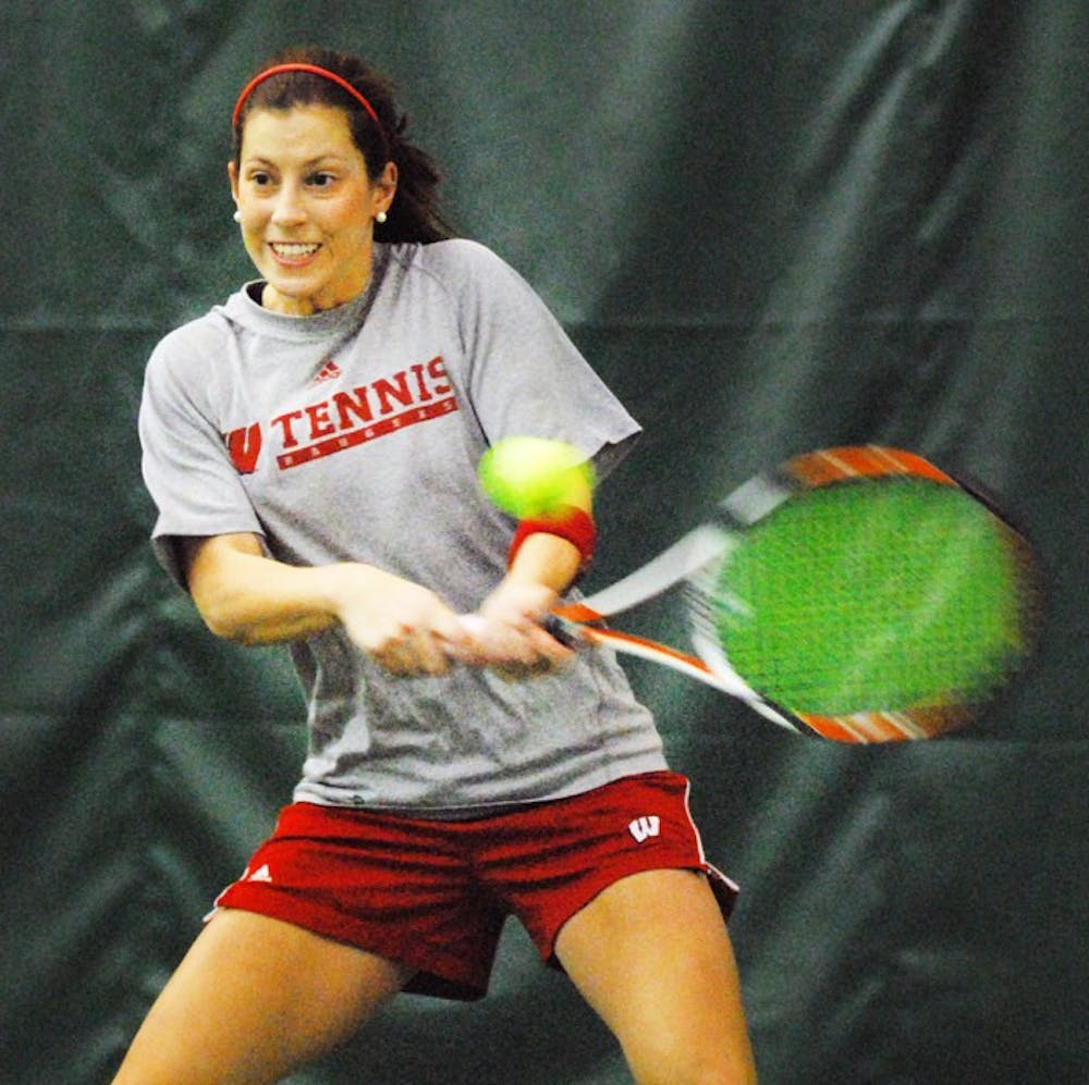 Wisconsin downs Marquette, falls to William & Mary