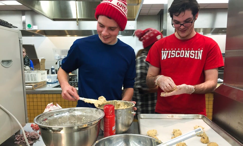 UW-Madison students participated in the event Sweets for Smiles, which was organized by Wisconsin Union Directorate Cuisine and WUD Alternative Breaks, to discuss homelessness and bake food for individuals in shelters.