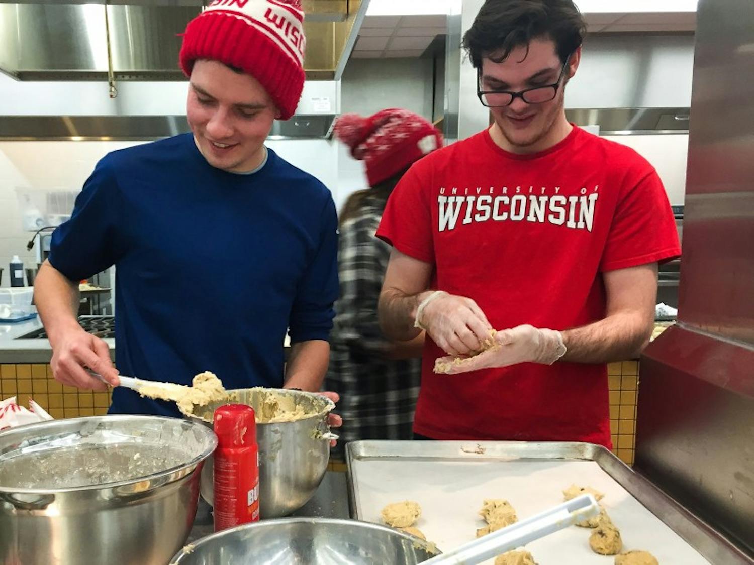 UW-Madison students participated in the event Sweets for Smiles, which was organized by Wisconsin Union Directorate Cuisine and WUD Alternative Breaks, to discuss homelessness and bake food for individuals in shelters.