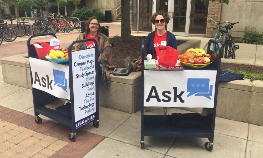 UW-Madison librarians have taken to the streets to give directions, advice and snacks to those who need guidance during the first few days of classes.