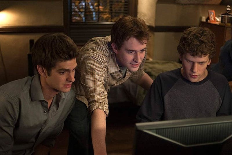 Jesse Eisenberg, Joseph Mazzello and Andrew Garfield star as curious college students in "The Social Network." 