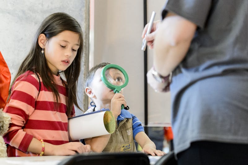  Young attendees magnify the 2015 Wisconsin Science Festival.