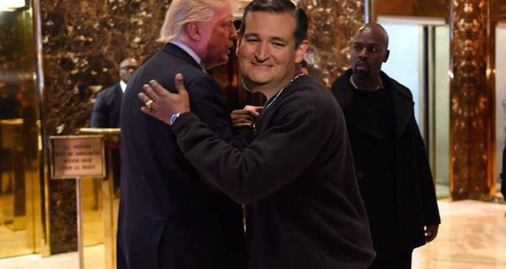 New bros embrace as a shocked onlooker realizes the country’s impending doom.