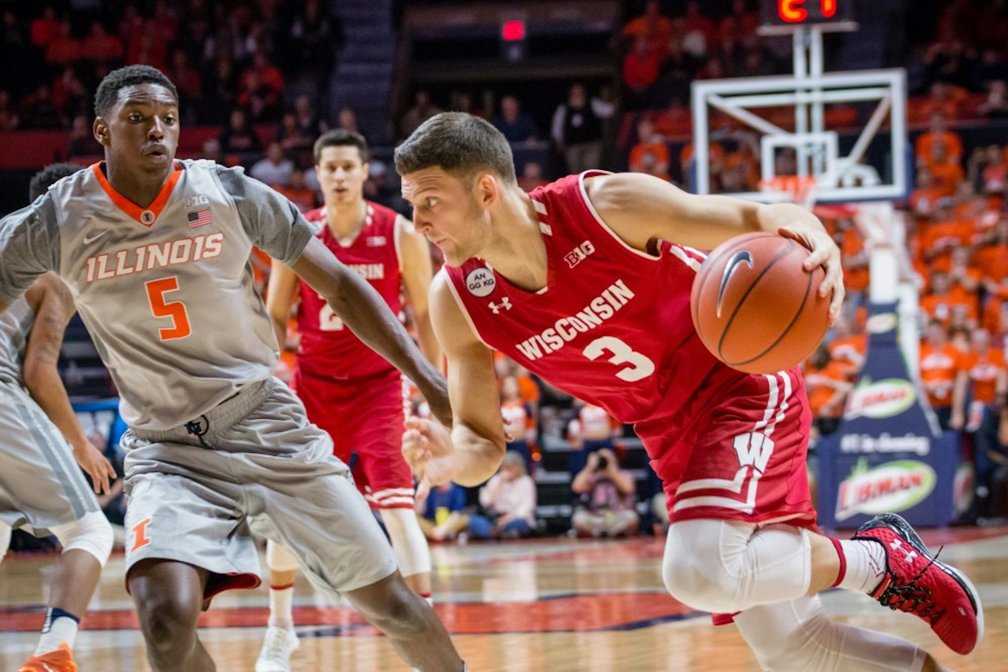 Wisconsin's Zak Showalter (3) drives to the basket during the game against Illinois at State Farm Center on Tuesday, January 31.