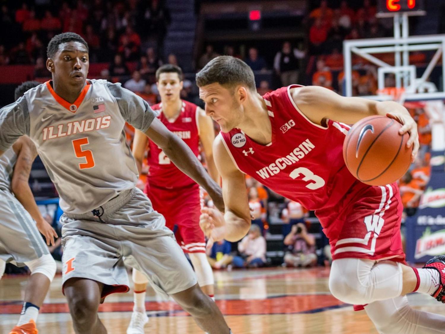 Wisconsin's Zak Showalter (3) drives to the basket during the game against Illinois at State Farm Center on Tuesday, January 31.