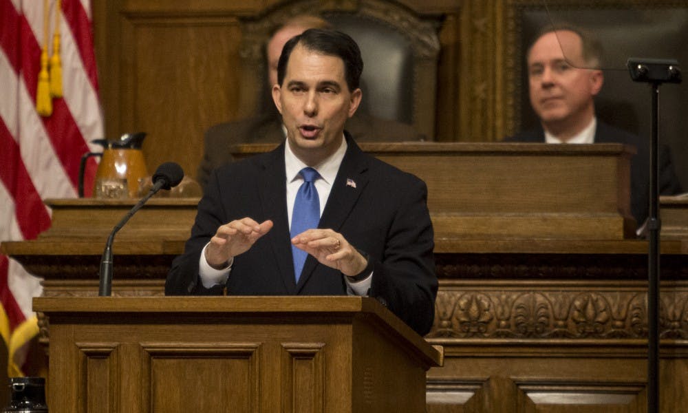 Gov. Scott Walker issued an executive order Monday prohibiting state government from making any plan to comply with the Clean Power Plan.