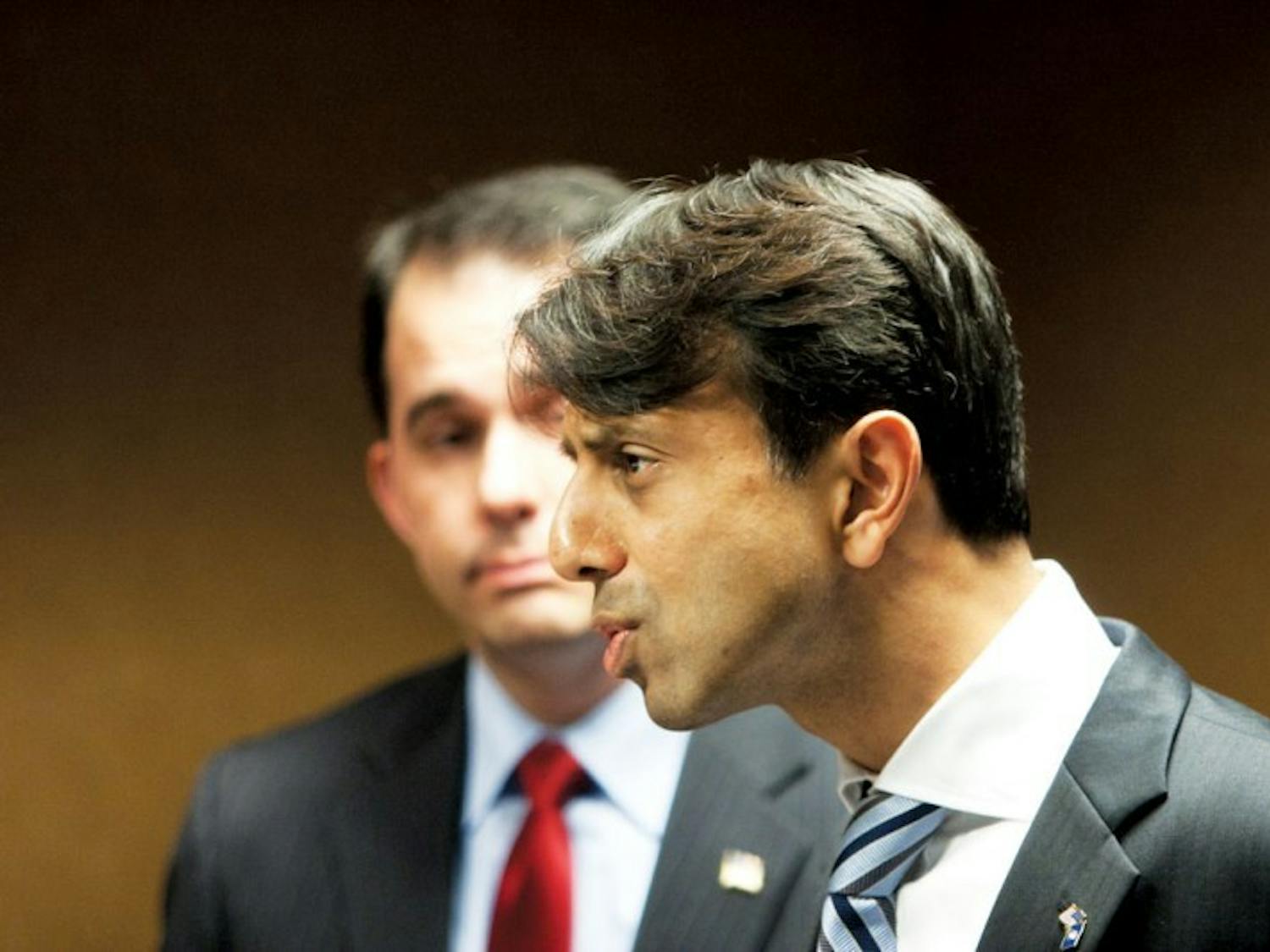 Jindal stumps for Walker, gets flack from La. students