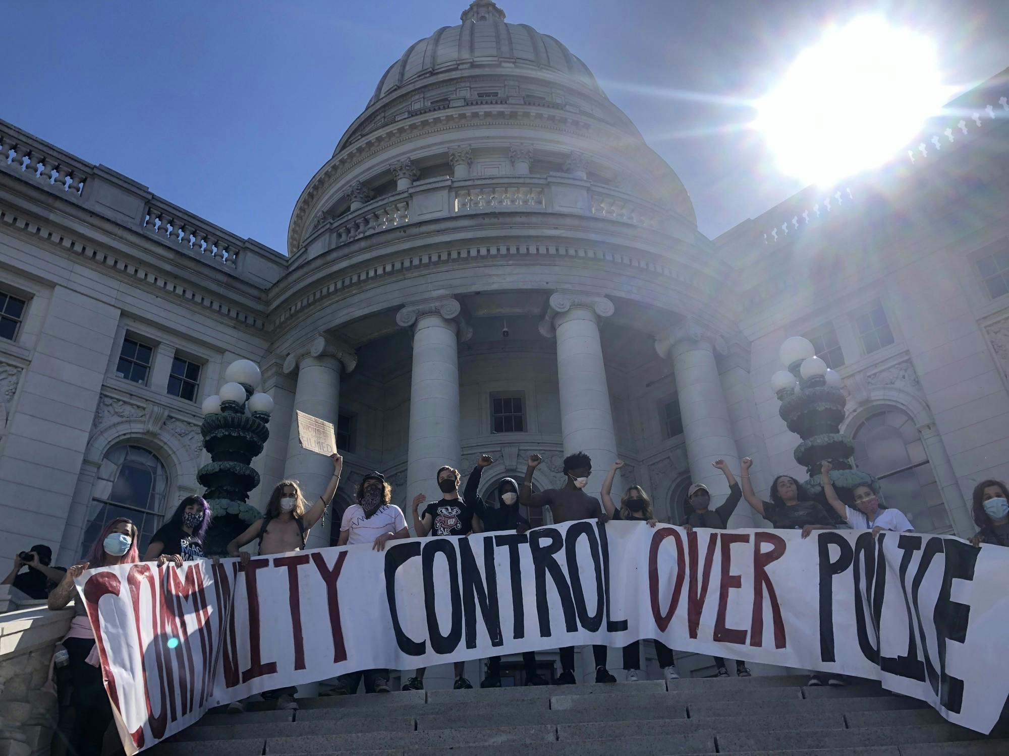 Peaceful protesters protest racial inequality in front of the Wisconsin State Capitol