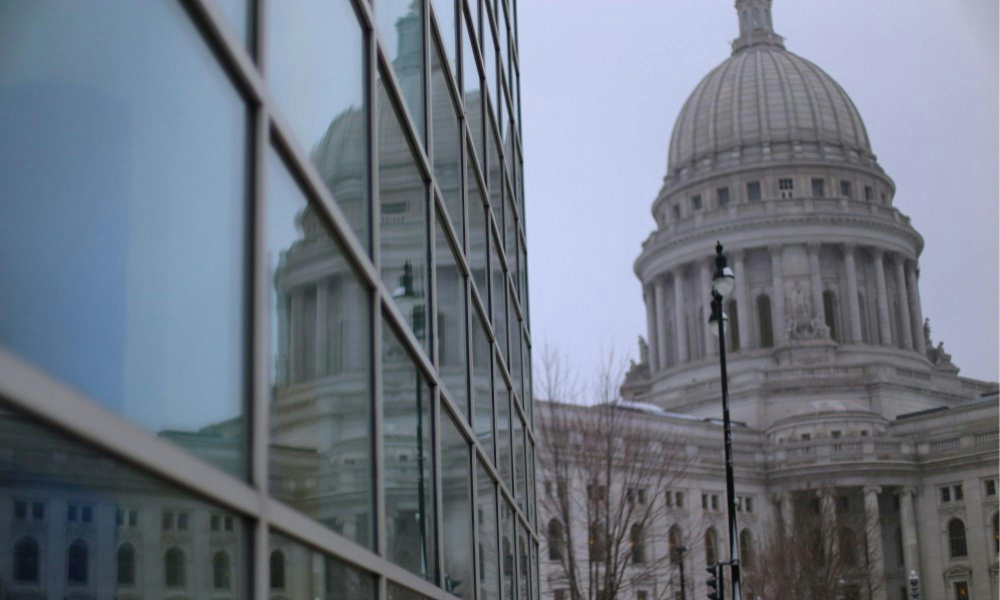 In an act of community healing and activism, student protesters from across the Madison area staged a die-in at the Capitol to urge lawmakers to pass stricter gun control measures.