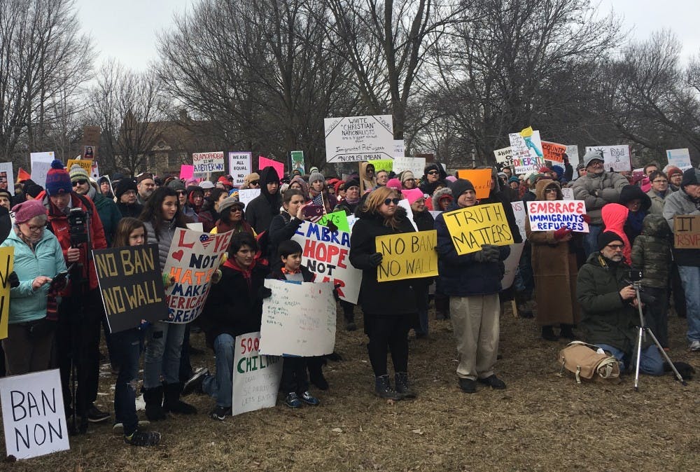 A crowd of over 1,000 protesters listened to speakers in Jefferson Park before picketing outside Speaker Paul Ryan’s office in downtown Janesville.