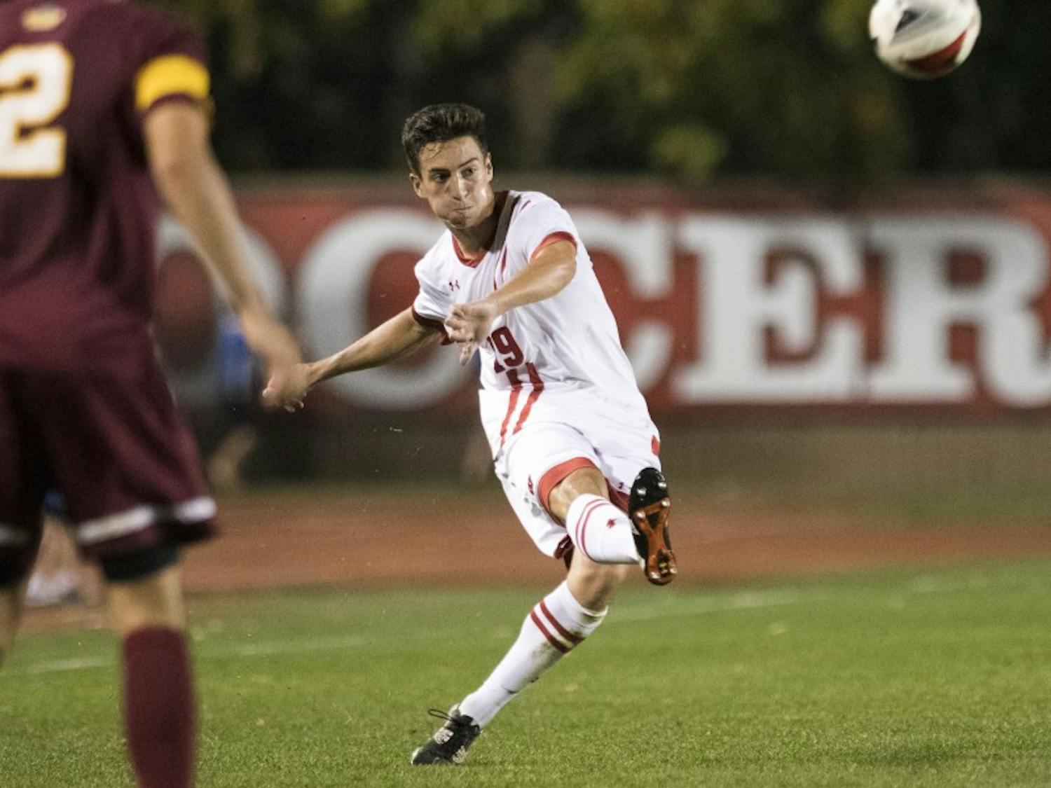Senior defender Isaac Schlenker scored his third goal of the season as the Badgers won 2-1 in overtime. 