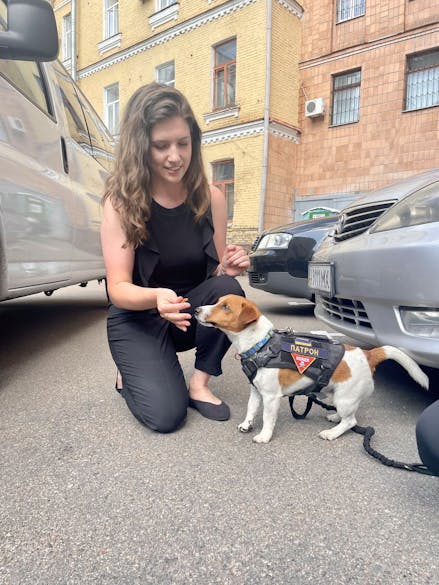 Brooke Harding and Patron, Ukraine's bomb-sniffing dog