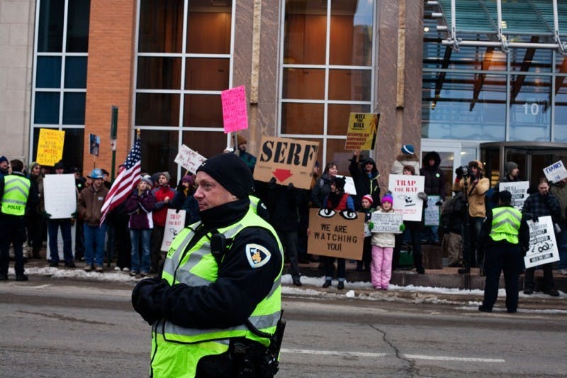 Protesters face Koch office, limitations