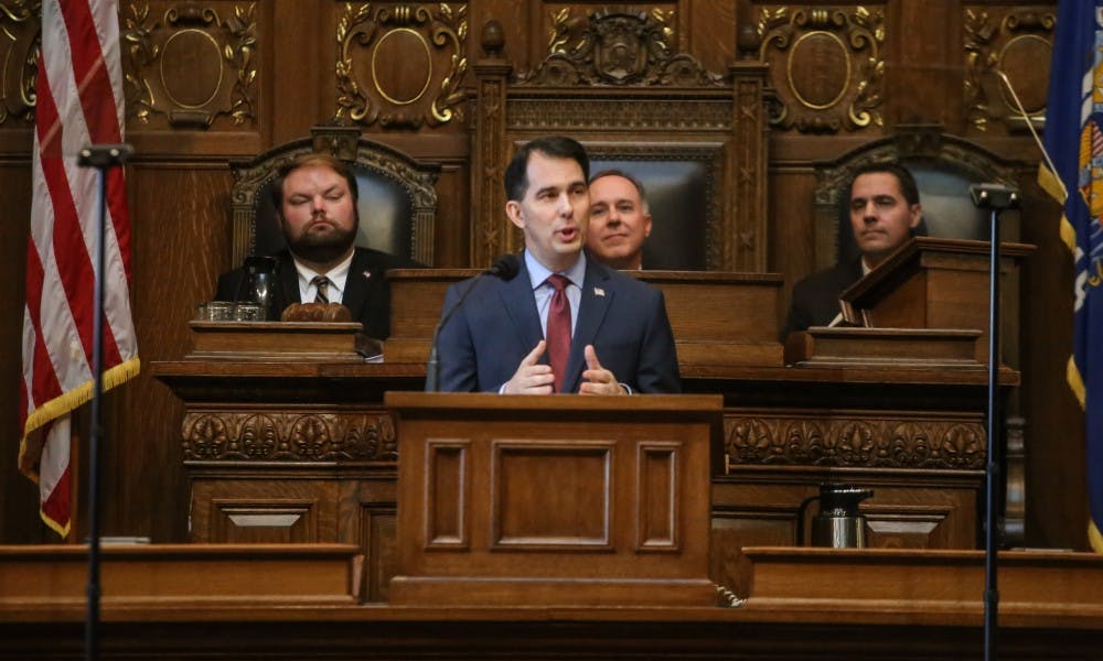 Gov. Scott Walker seeks to stabilize Obamacare markets following the national GOP’s axing of a key funding mechanism in their tax plan.