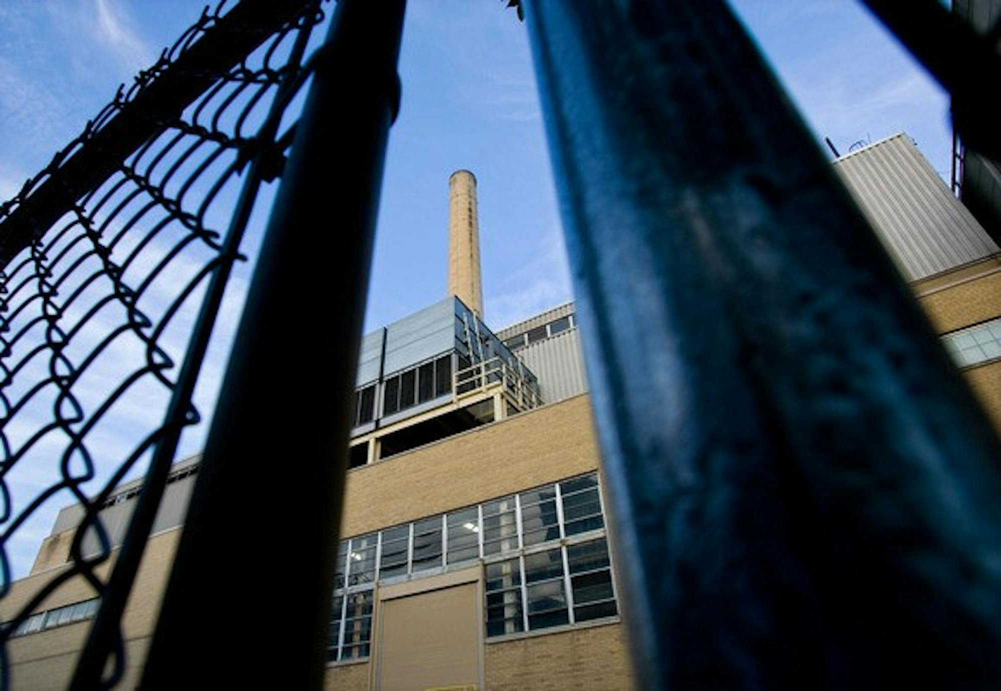 Charter heating plant to burn biomass, discontinue coal use