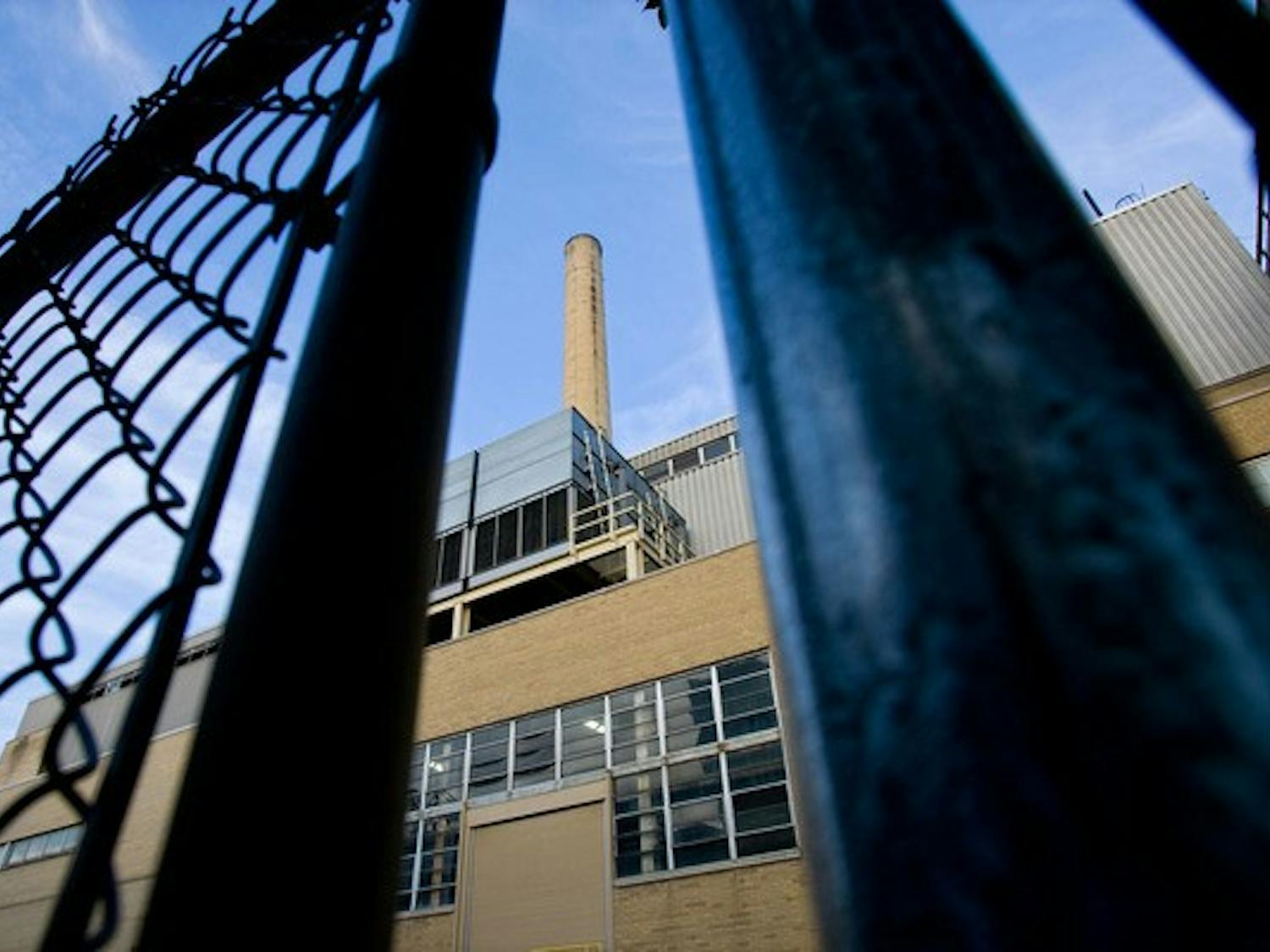 Charter heating plant to burn biomass, discontinue coal use