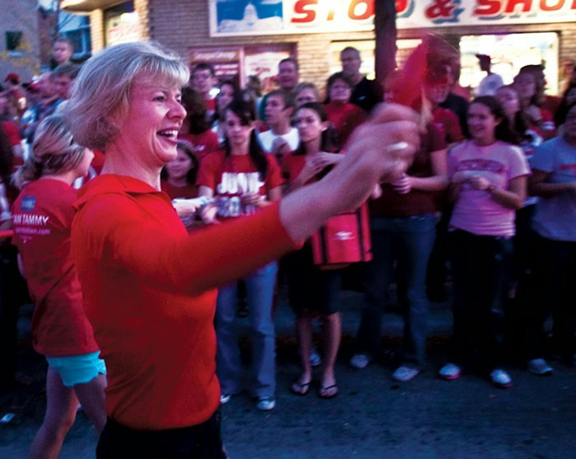 Candidates campaign during Homecoming festivities