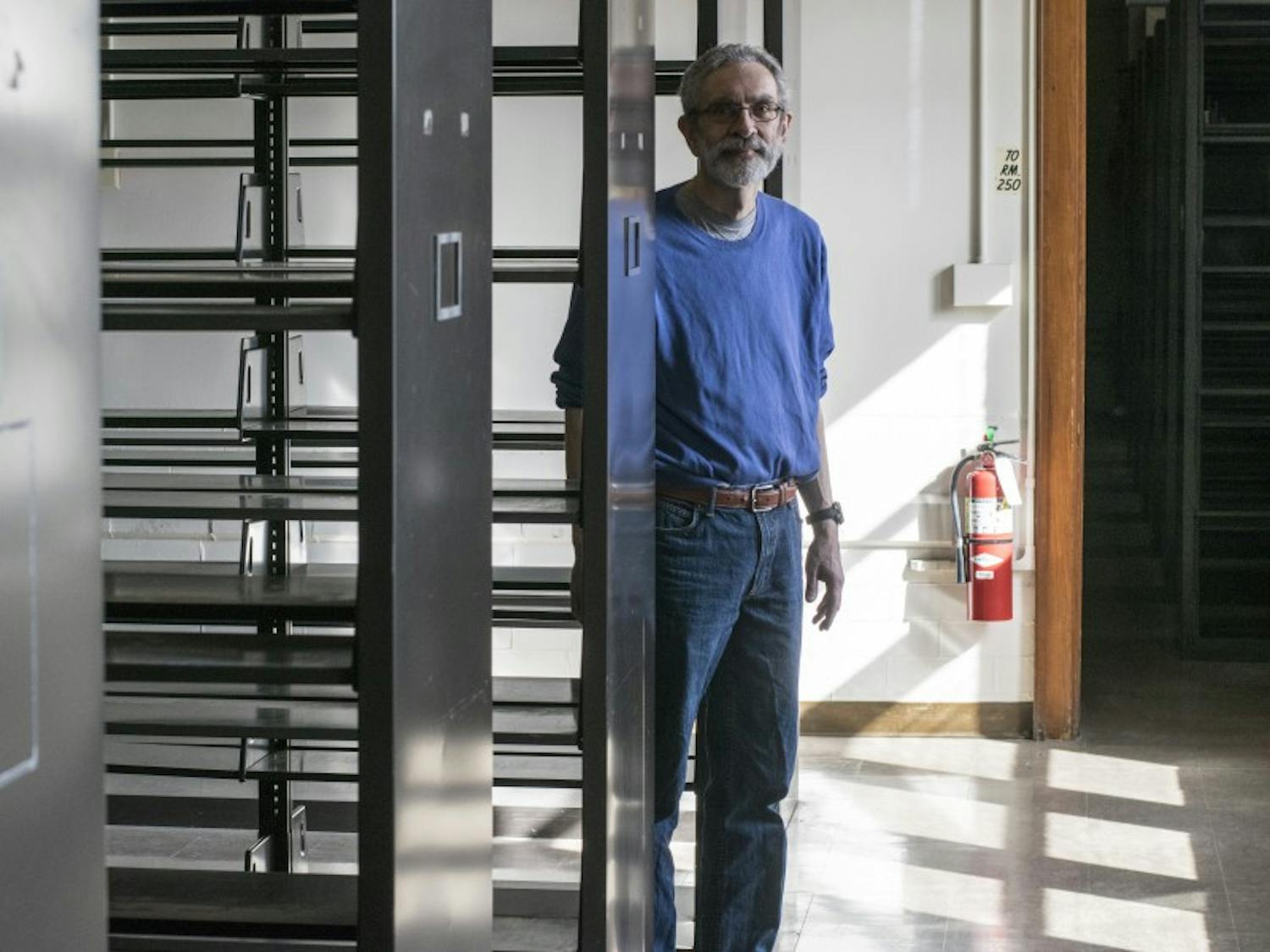 Librarian Tom Tews closed the book on the story of his past 30 years operating UW-Madison's Geography Library. The library is closing as part of UW-Madison's Facilities Master Plan.