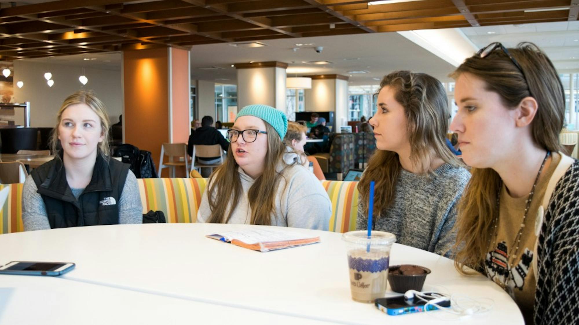 Members of the Climate Reality Campus Corps at UW-Madison (from left) Savannah Lipps, Lydia Stiegman and Mary Pierce and Climate Reality Project Midwest Regional Organizer Haley Hager talked about their efforts to urge UW-Madison to switch to renewable electricity by 2030.