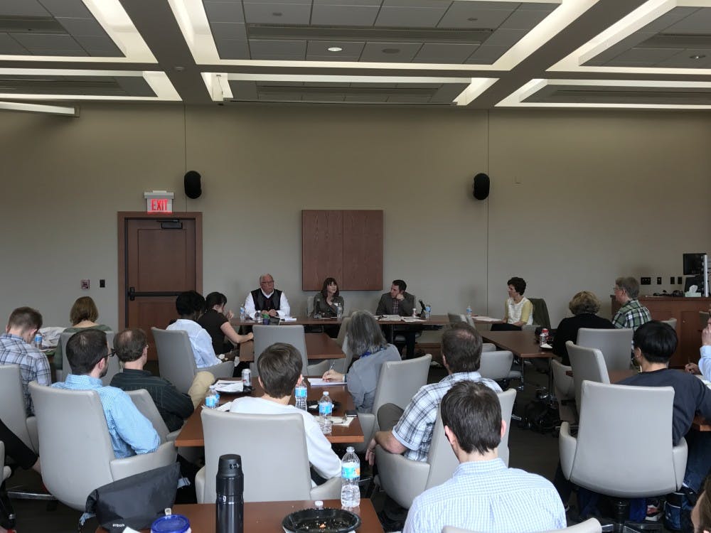 Lawmakers and researchers discussed barriers to increased collaboration between the university and state government Monday at a panel discussion.