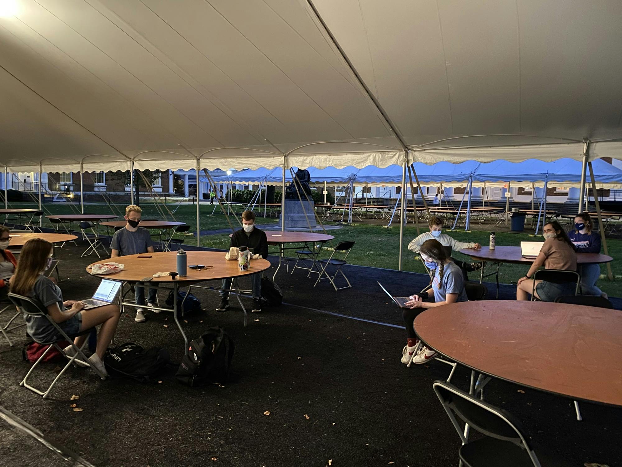 The University Democrats have gathered in open University spaces like the Lawn in masked and distanced groups of less than 10 to phone bank.