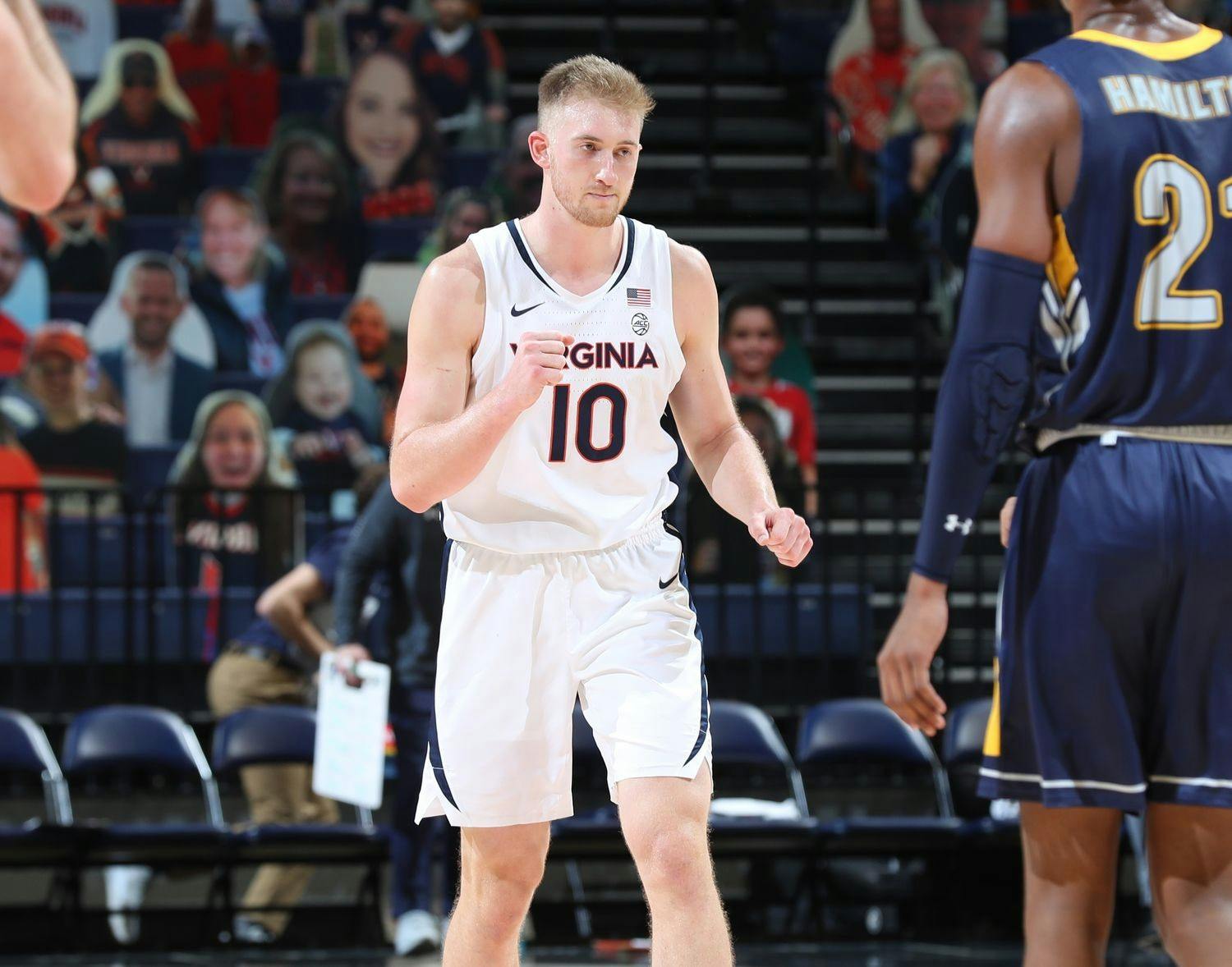 Senior forward Sam Hauser's scoring was crucial for Virginia in the overtime period as he led the Cavaliers to a tight victory.