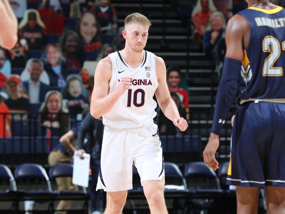 Senior forward Sam Hauser's scoring was crucial for Virginia in the overtime period as he led the Cavaliers to a tight victory.