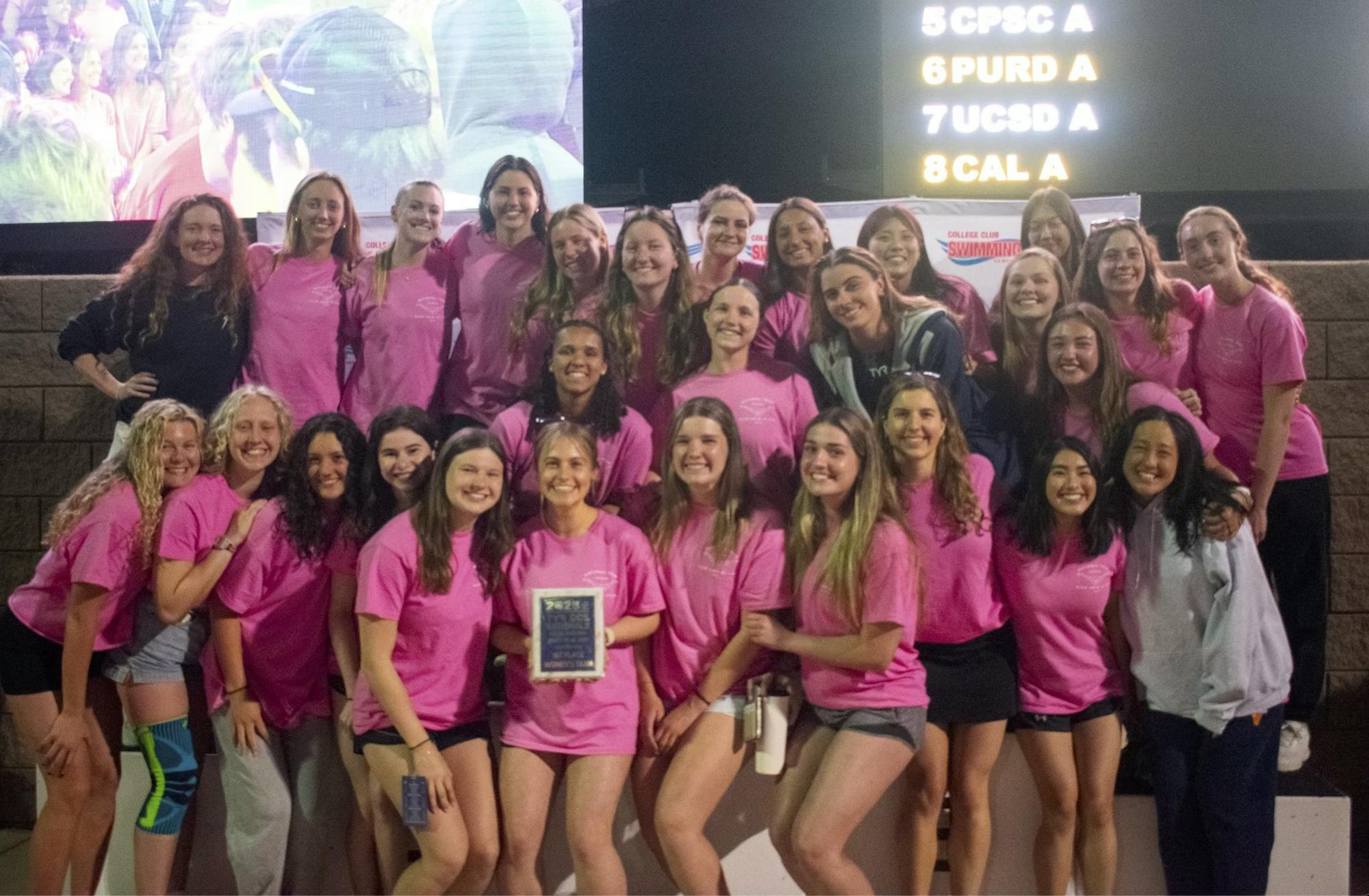 The team poses after winning a fourth consecutive national title.
