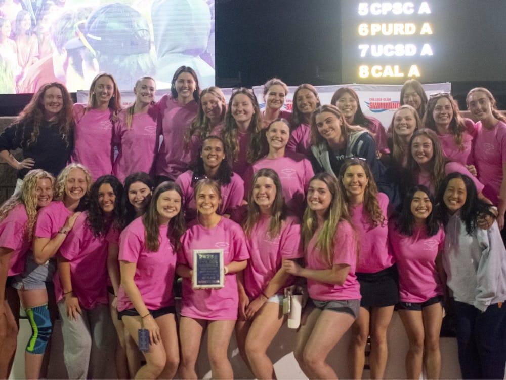 The team poses after winning a fourth consecutive national title.