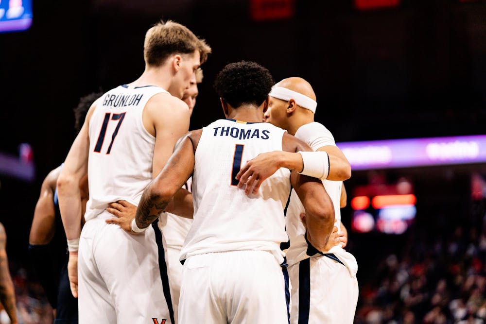Virginia players huddle during their exhibition game Friday against Villanova.