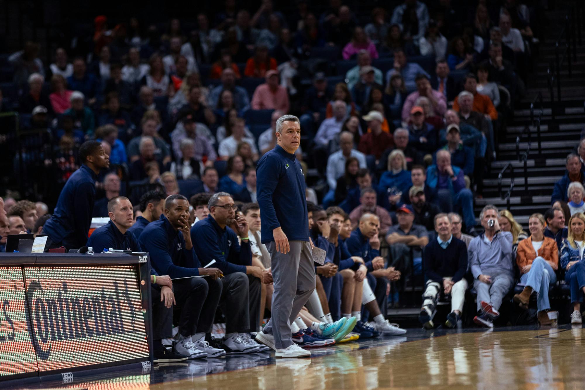 Bennett looks on as the Cavaliers battle Pittsburgh in an ACC clash.