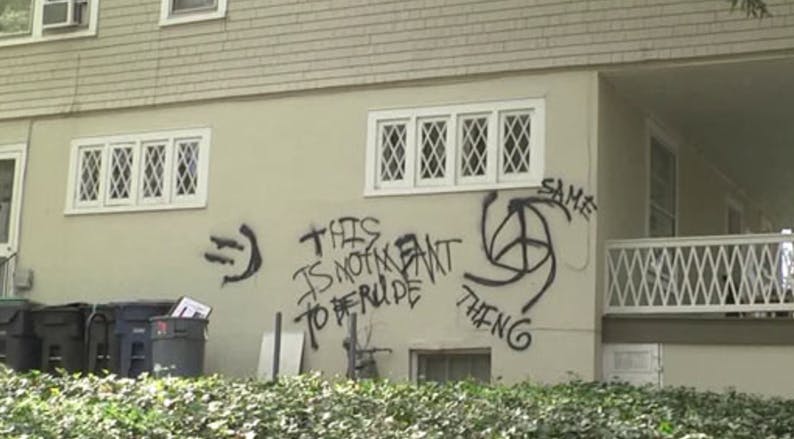 The rental company who owns the house, Management Services Corporation, washed the graffiti off Monday and sent a crew to repaint the wall Tuesday.