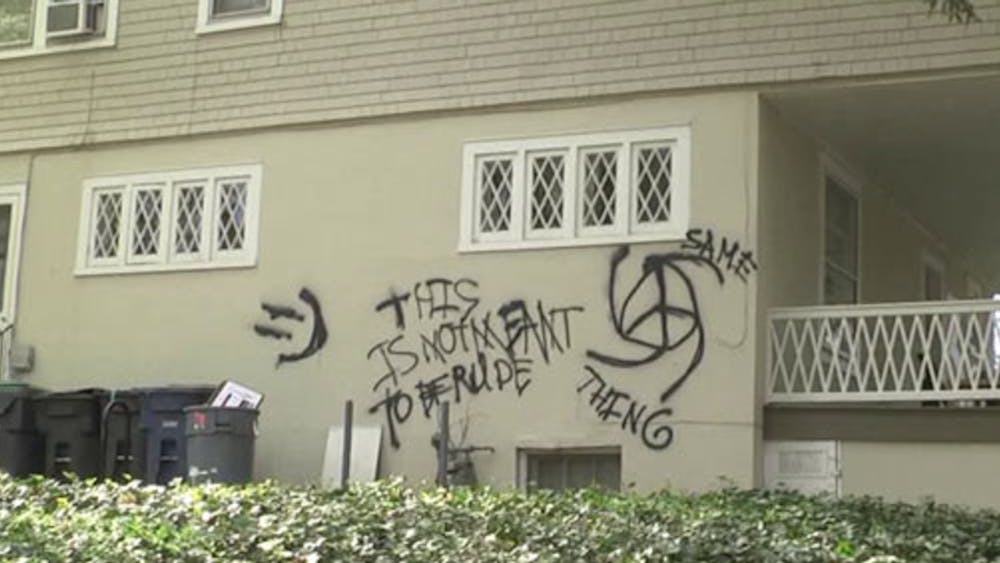 The rental company who owns the house, Management Services Corporation, washed the graffiti off Monday and sent a crew to repaint the wall Tuesday.