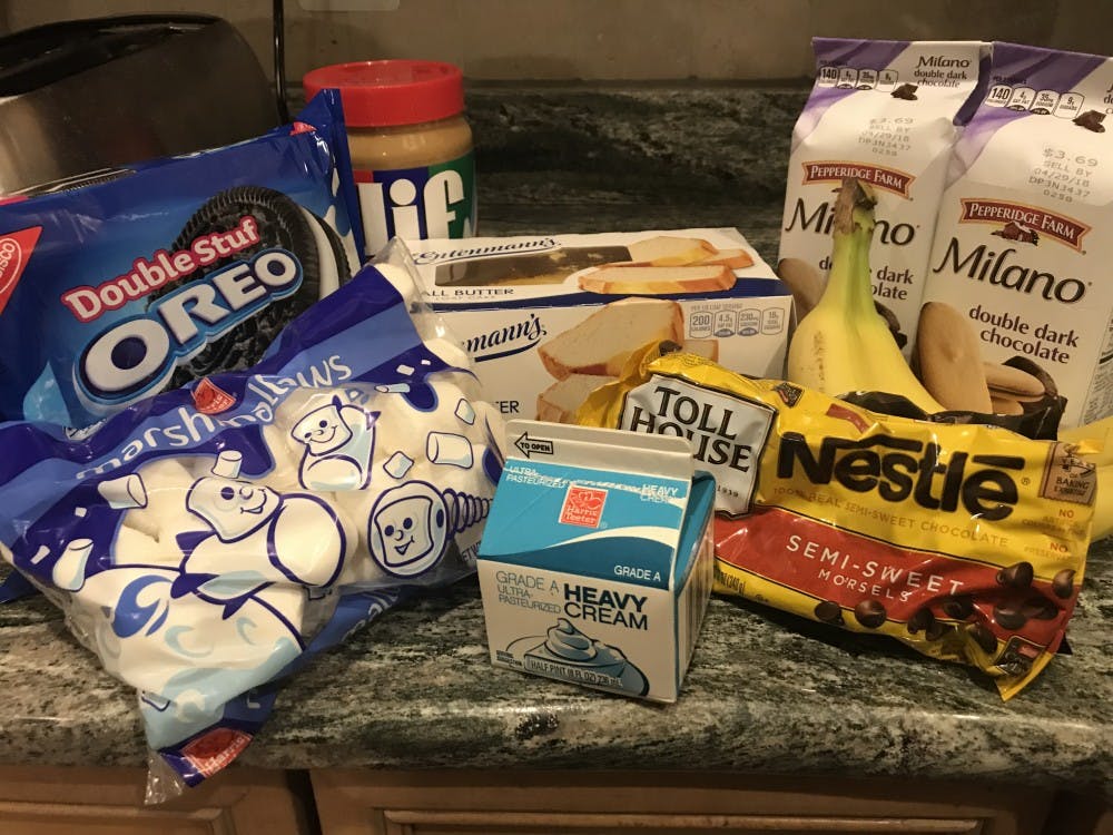 Marshmallows, pound cake, bananas, Oreos, Milano cookies, brownies, strawberries, rice crispies and graham crackers are all great choices to dip into your chocolate fondue.&nbsp;