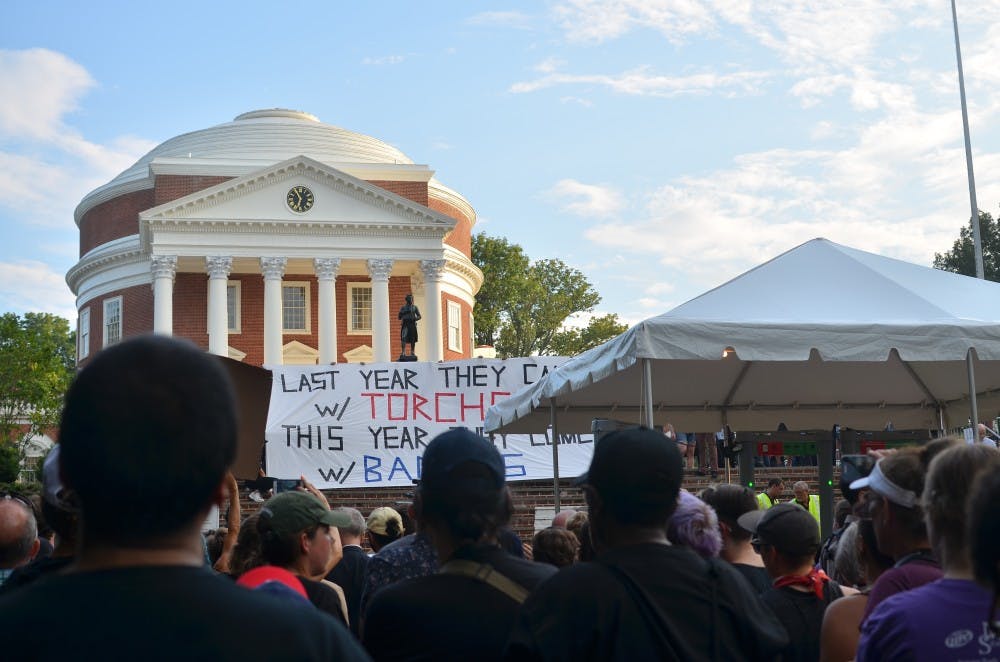 Protesters gather outside the Rotunda to protest the police presence on Aug. 11, 2018.