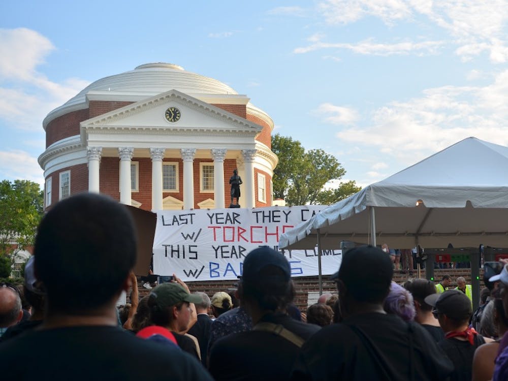 Protesters gather outside the Rotunda to protest the police presence on Aug. 11, 2018.