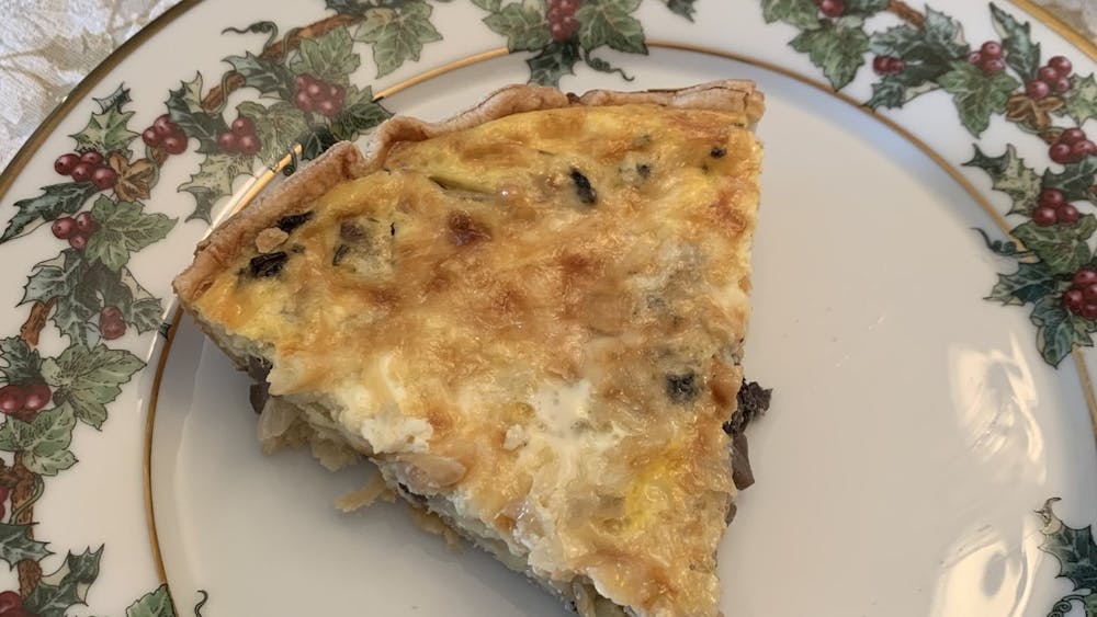 This is a vegetarian-friendly, mushroom quiche variant of the quiche Lorraine recipe featured in the article.&nbsp;