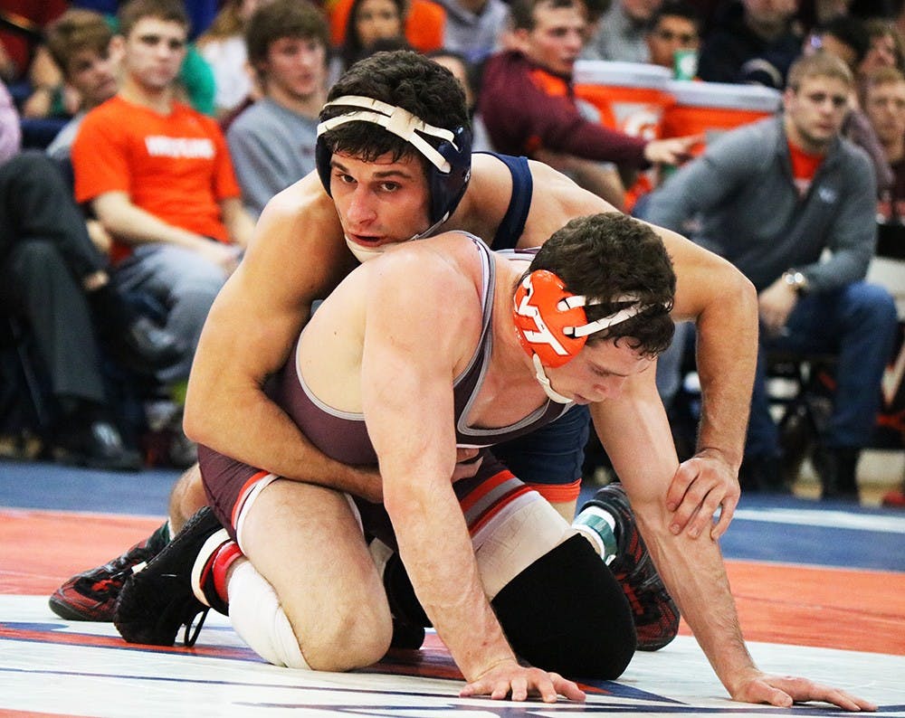 Sophomore Andrew Atkinson has wrestled tough in has last two matches, both losses to ranked foes