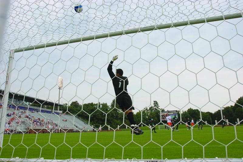 South Florida Bulls GK Diego Restrepo (1) leaps for a shot from UVA.  The Virginia Cavaliers faced the South Florida Bulls in an exhibition game at Klockner Stadium in Charlottesville, VA on August 26, 2007