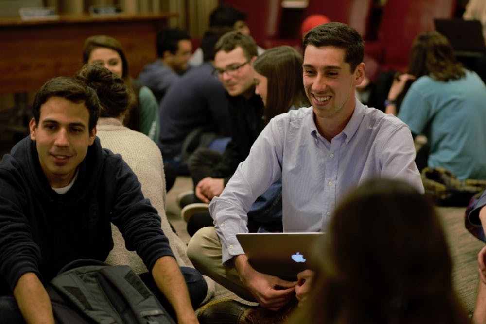 Newly appointed University Judiciary Committee members converse at an Oct. 14 meeting of the committee.&nbsp;