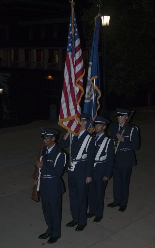 At the second annual Never Forget event, students, led by University Air Force ROTC members, processed from Minor Hall to South Lawn.