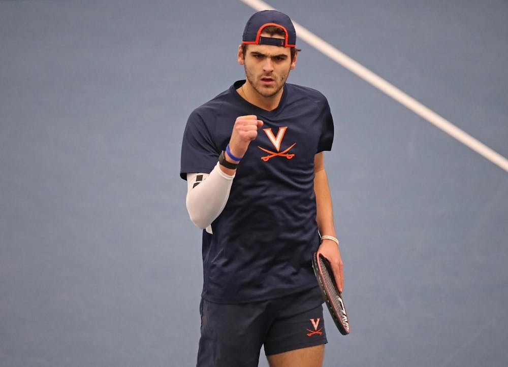 <p>Virginia competes in an indoor match earlier this season.</p>