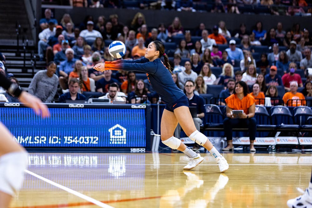 <p>Senior setter Ashley Le keeps the ball alive during a match against Virginia Tech in 2023.&nbsp;</p>