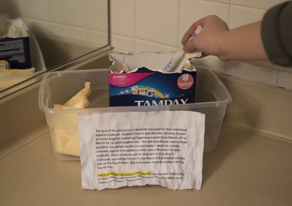 <p>&nbsp;A container with feminine hygiene products in a restroom in Newcomb Hall from Student Council's first trial run earlier this year.&nbsp;&nbsp;</p>